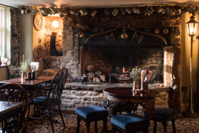 Magnificent fireplace at The Bull. Interiors designed by Russell Sage Studio Ltd.